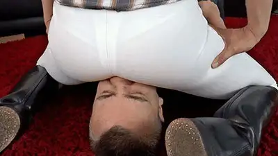 Madame Marissa - Smothering the slave under riding pants
