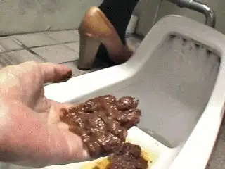 Toilet Slaves Scatology - Unknown man holding shit in public toilet!