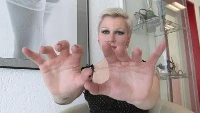 Boss Girls Productions - Gothic girl is showing her hands
