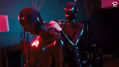 Rubber-Pervs - A Rubber Mistress and her stretch foil worm