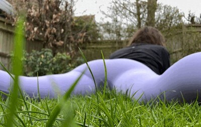 Weeing on the grass in leggings