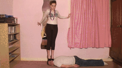 Sophie Teases Her Slave Whilst Stepping On His Head